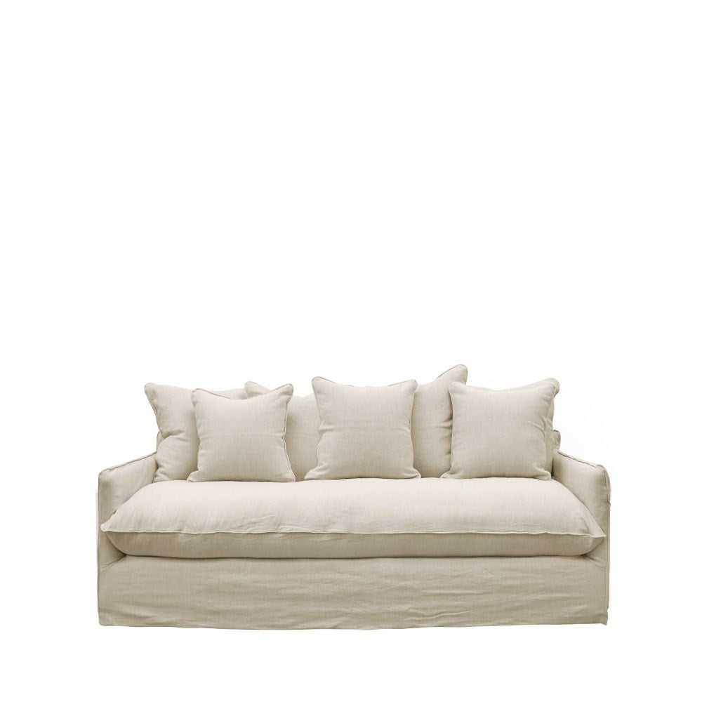 Warm oatmeal linen sofa with a tailored base and five scatter-style cushions for a cosy, refined look.