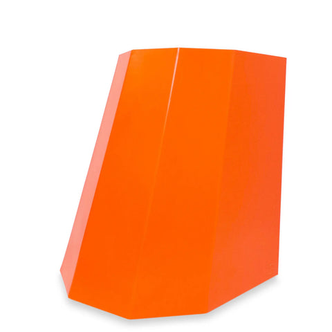 Bold orange geometric metal stool with sculptural angles and matte finish, ideal for indoor or outdoor spaces