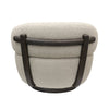 Back view of boucle upholstered swivel chair with smooth curved lines and dark wood base detail