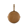 Gold cast iron skillet with 'ASTRO' branding 