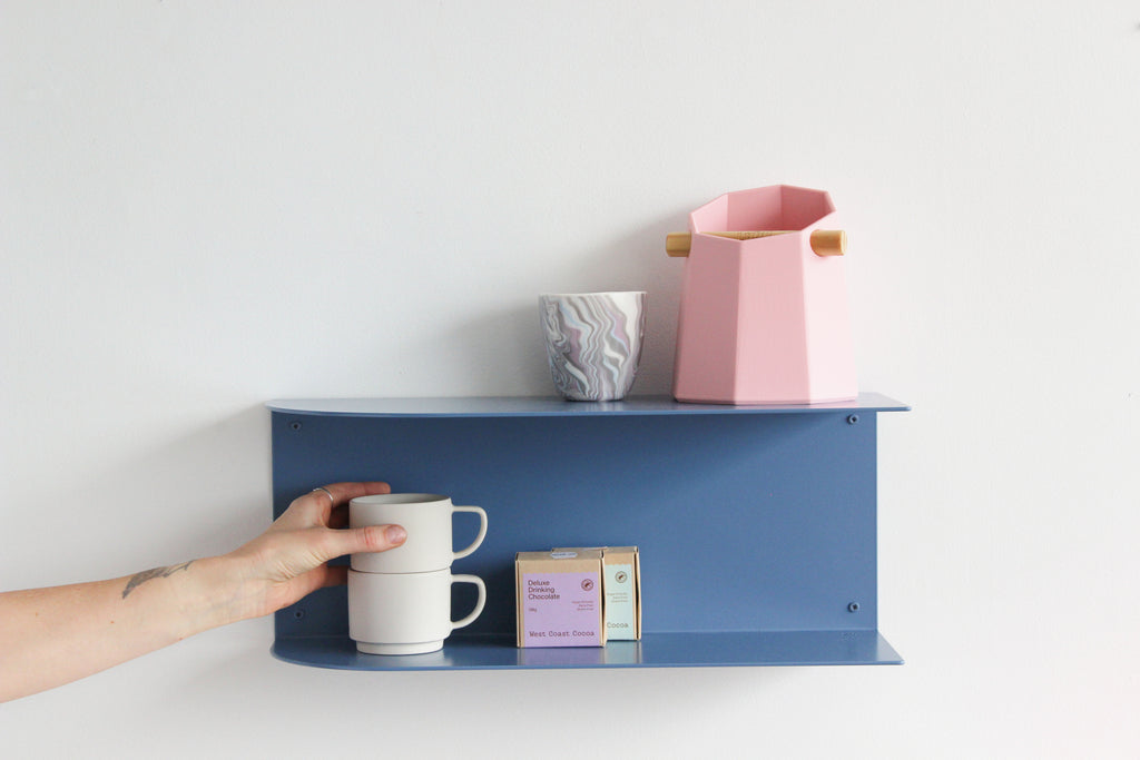 The perfect size bedside shelf to hold all the goodies, in the kitchen, bedroom, outside Blue shelf holding Luigi knock box, citta mugs 