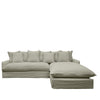 Front view of an modular sectional sofa in natural khaki linen, featuring plush back cushions and a skirted base.