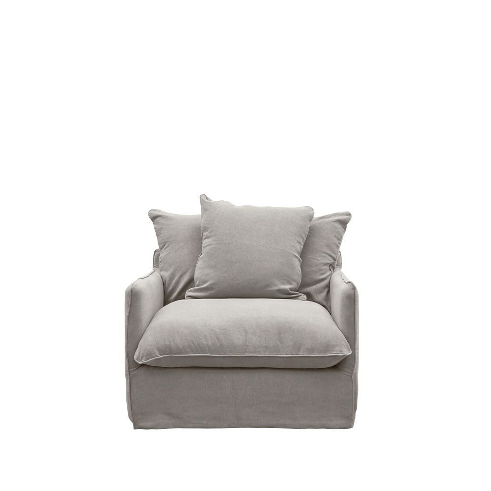 Modern oversized armchair in soft light grey linen with deep seat and plush back cushions.
