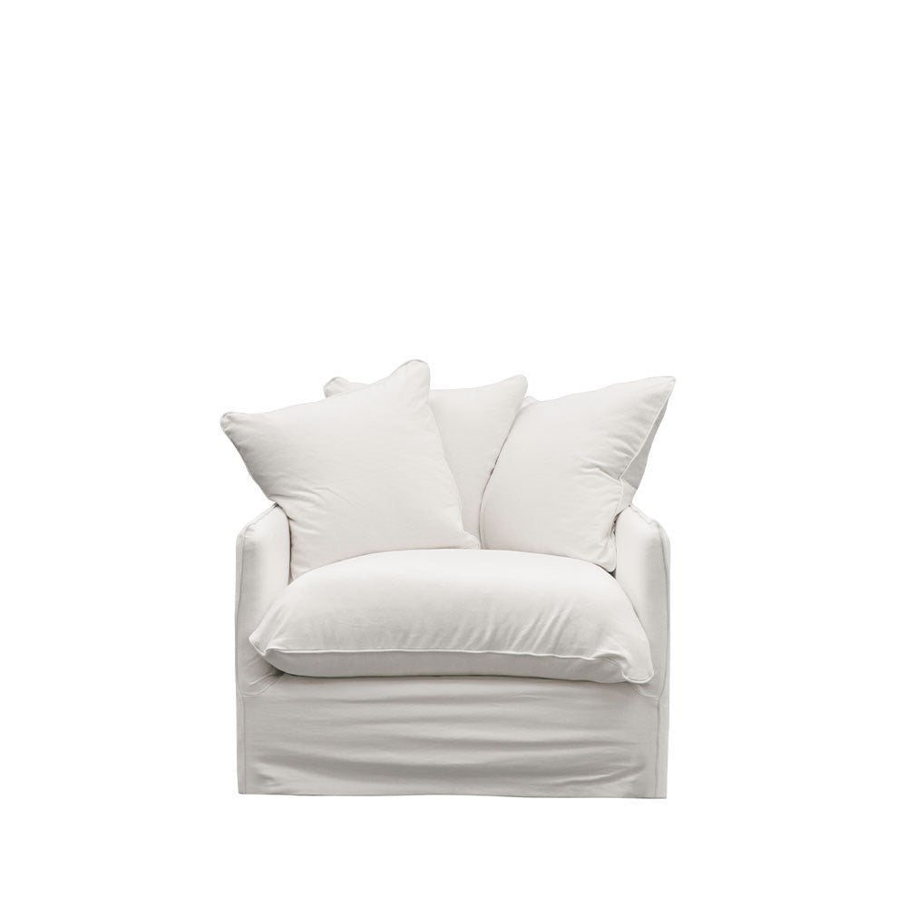 Classic armchair in warm oatmeal linen with rounded arms and plush back support.