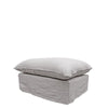 Modern light grey linen ottoman with a plush cushion and neatly tailored skirt base, photographed against white.