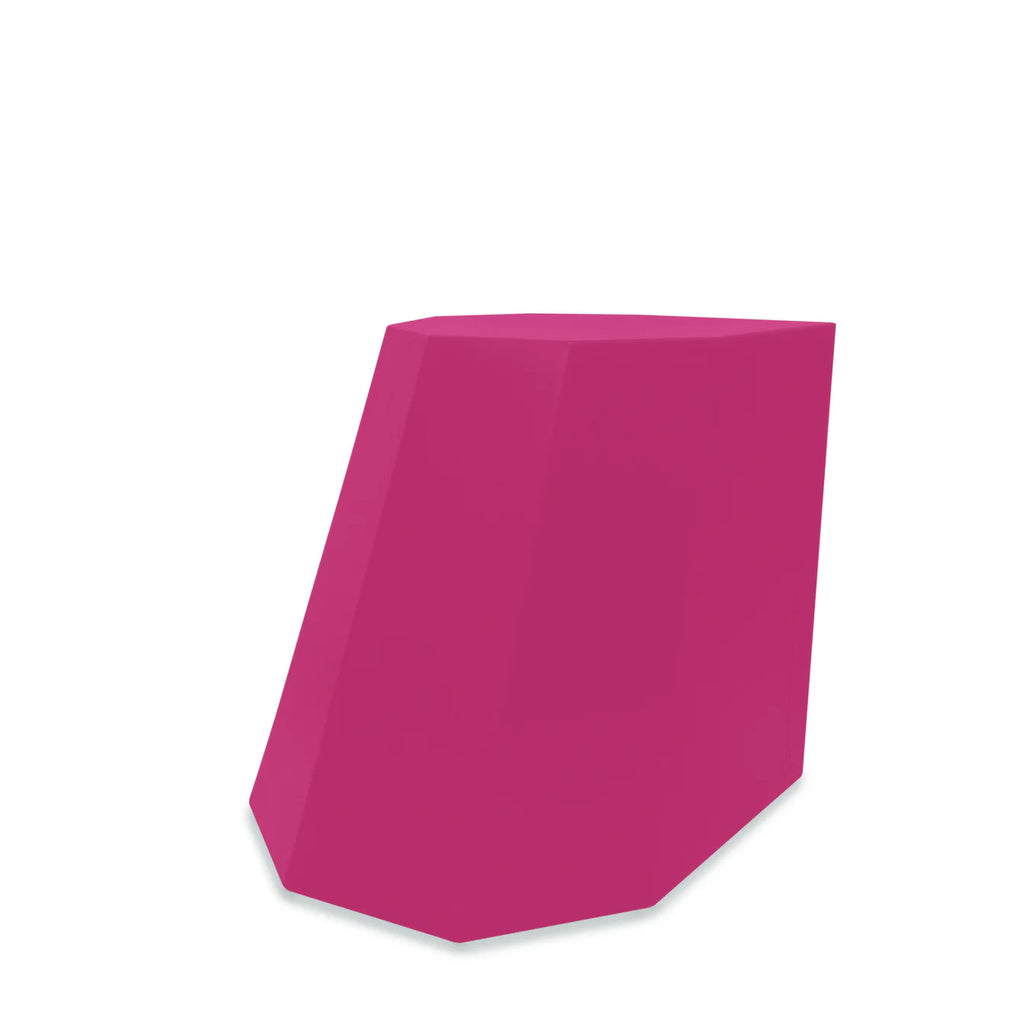 Bold magenta geometric stool with a faceted design — adds a pop of colour and modern flair to any space.