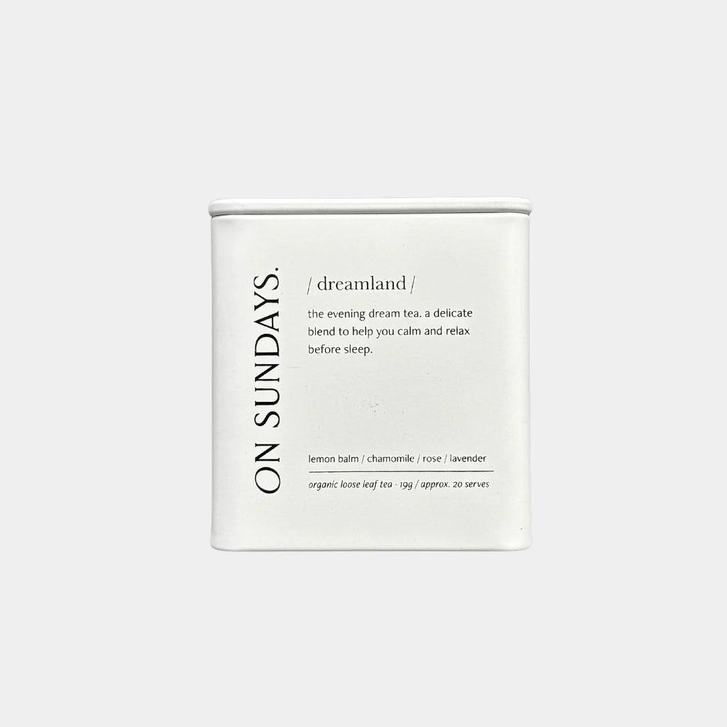 On Sundays Dreamland tea tin featuring an organic loose leaf blend with lemon balm, chamomile, rose and lavender to support restful sleep.