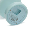 Close-up of the underside of a light blue cylindrical product, showing printed specifications, a vented panel, screws, and a power button symbol on a white background.