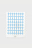 Flat lay of a white tea towel featuring a light blue harlequin pattern and "Father Rabbit" branding at the base.