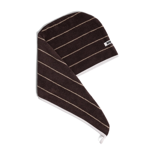 Brown head towel with white stripes on a white background