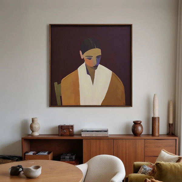Living room with a large abstract painting on the wall, wooden sideboard, and decorative items.