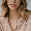 Pretty Stirling Silver Daisy necklace on model 