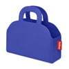A royal blue silicone baby or food or bottle carrier shaped like a handbag, featuring integrated handles and a small red fabric brand tag on the side with the white text 'fatboy'.